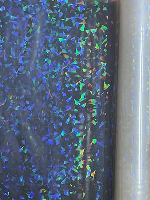 ราคาดี คัลเล็ต โฮโลแกรฟิก คาเลย์โดสโกปี ฟิล์มการละเมินทางความร้อน สําหรับการตกแต่งบรรจุภัณฑ์เครื่องสําอาง ออนไลน์